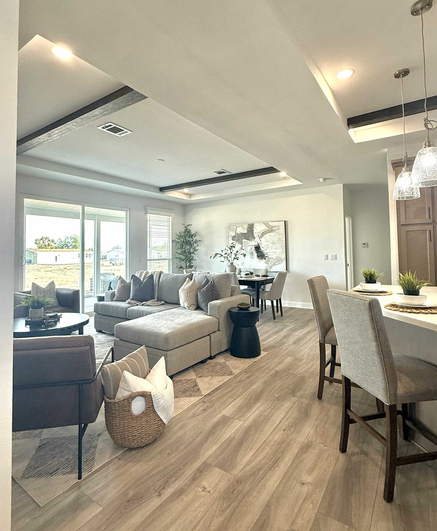 Bright staged living and kitchen space prepared for listing photos