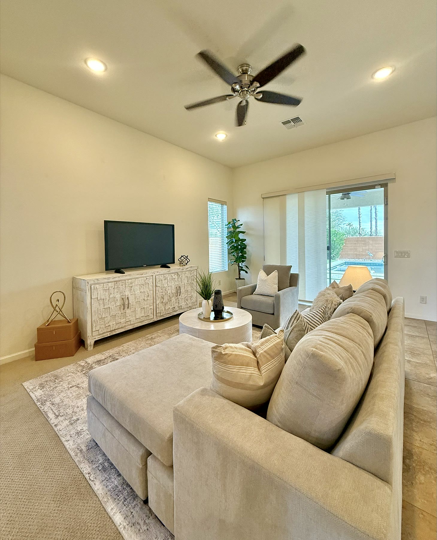 Eloy living room staged for bright buyer appeal