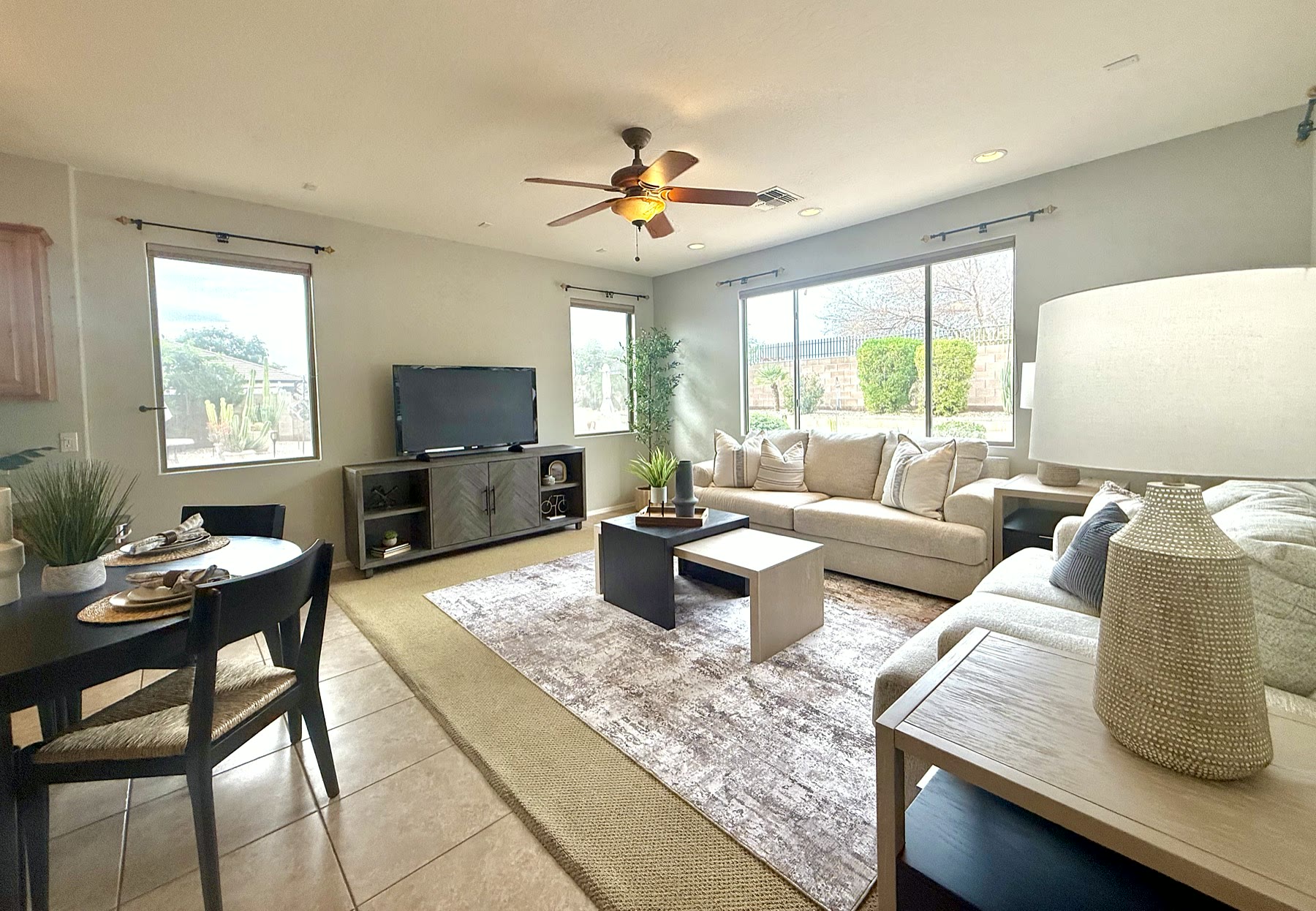 Gilbert living room staged with warm seating and decor