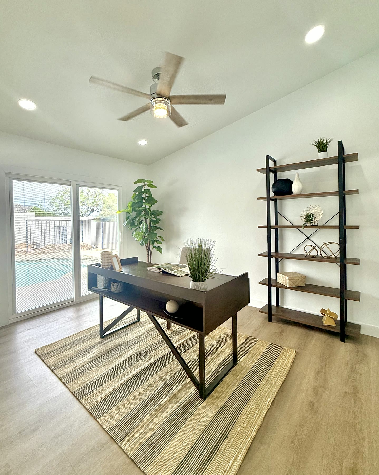 Phoenix home office staged with a desk and simple decor