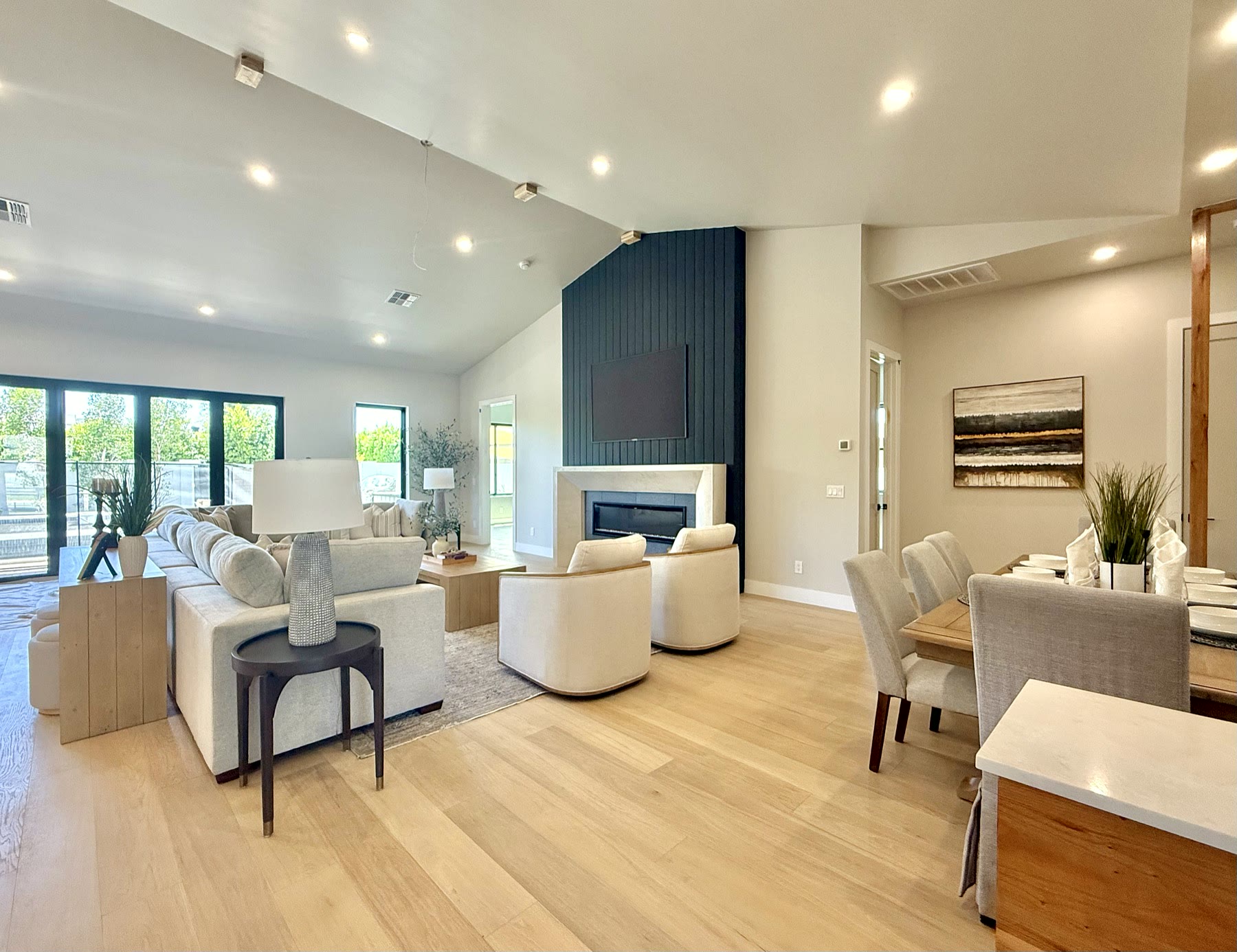 Staged living room with natural light and modern seating